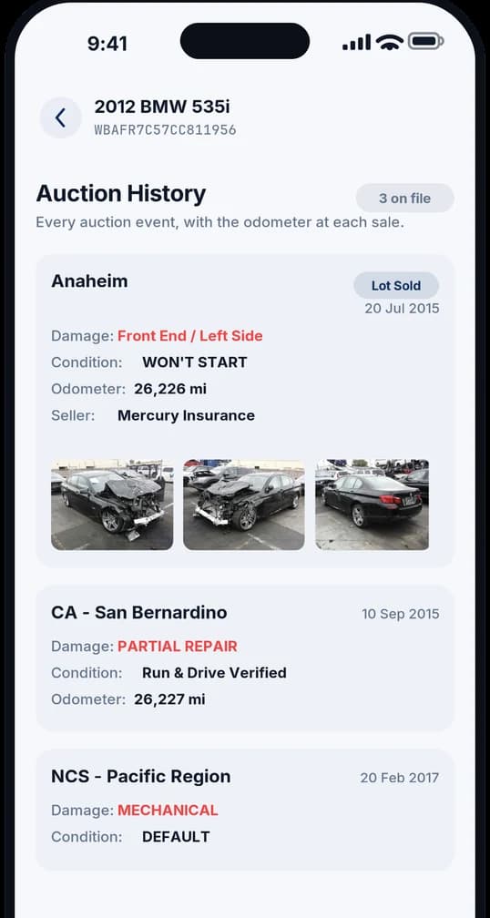 Auction records screen listing past auction appearances with the photos taken at those sales