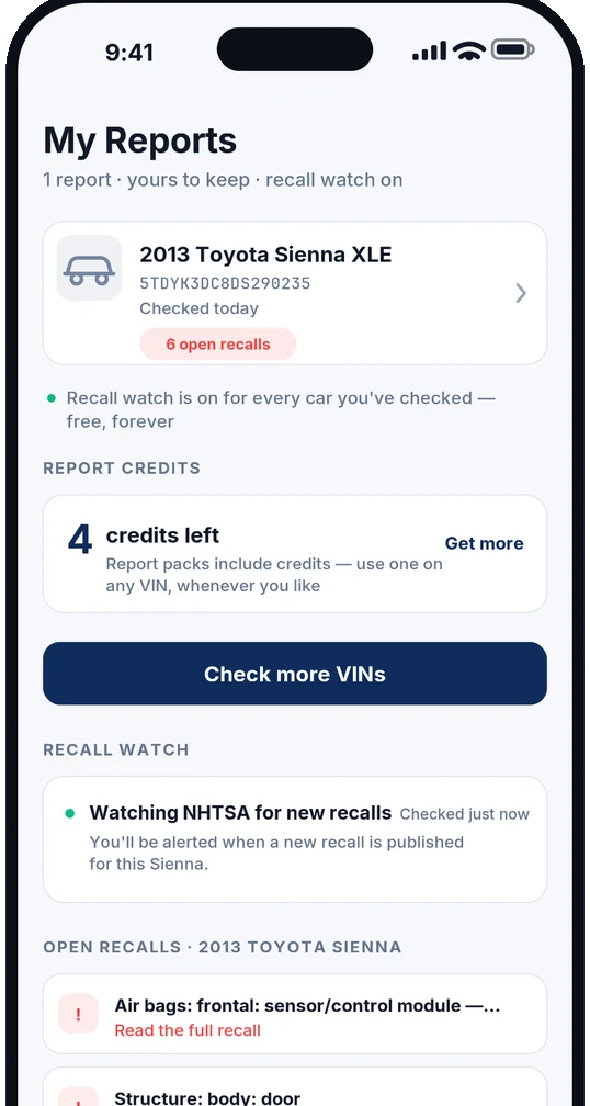 My Reports screen showing a 2013 Toyota Sienna XLE with six open recalls, recall watch on, and four report credits remaining