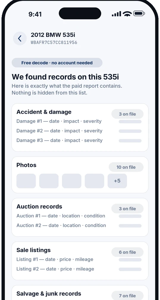 CarCheckerVIN app showing record counts for a 2012 BMW 535i before payment — 3 damage records, 10 photos, 3 auction records, 6 sale listings and 7 salvage and junk records on file