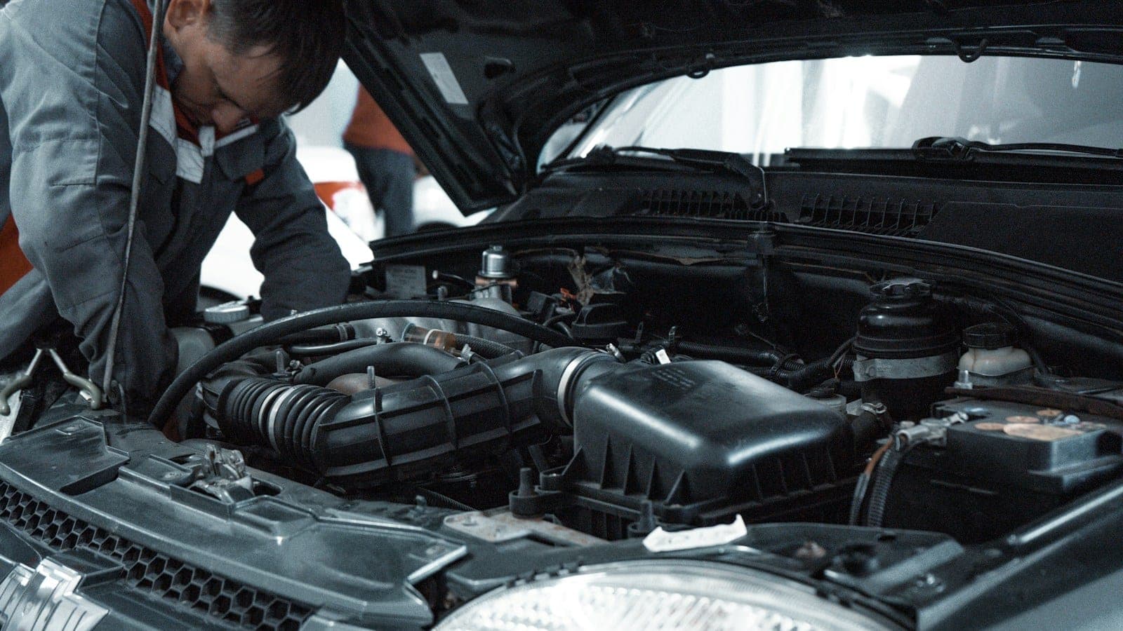 used car warranty inspection workshop — vehicle photo