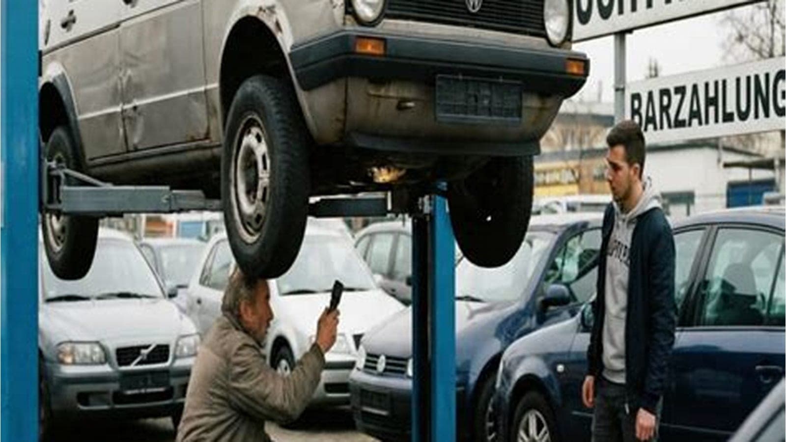 used car private sale handshake — vehicle photo