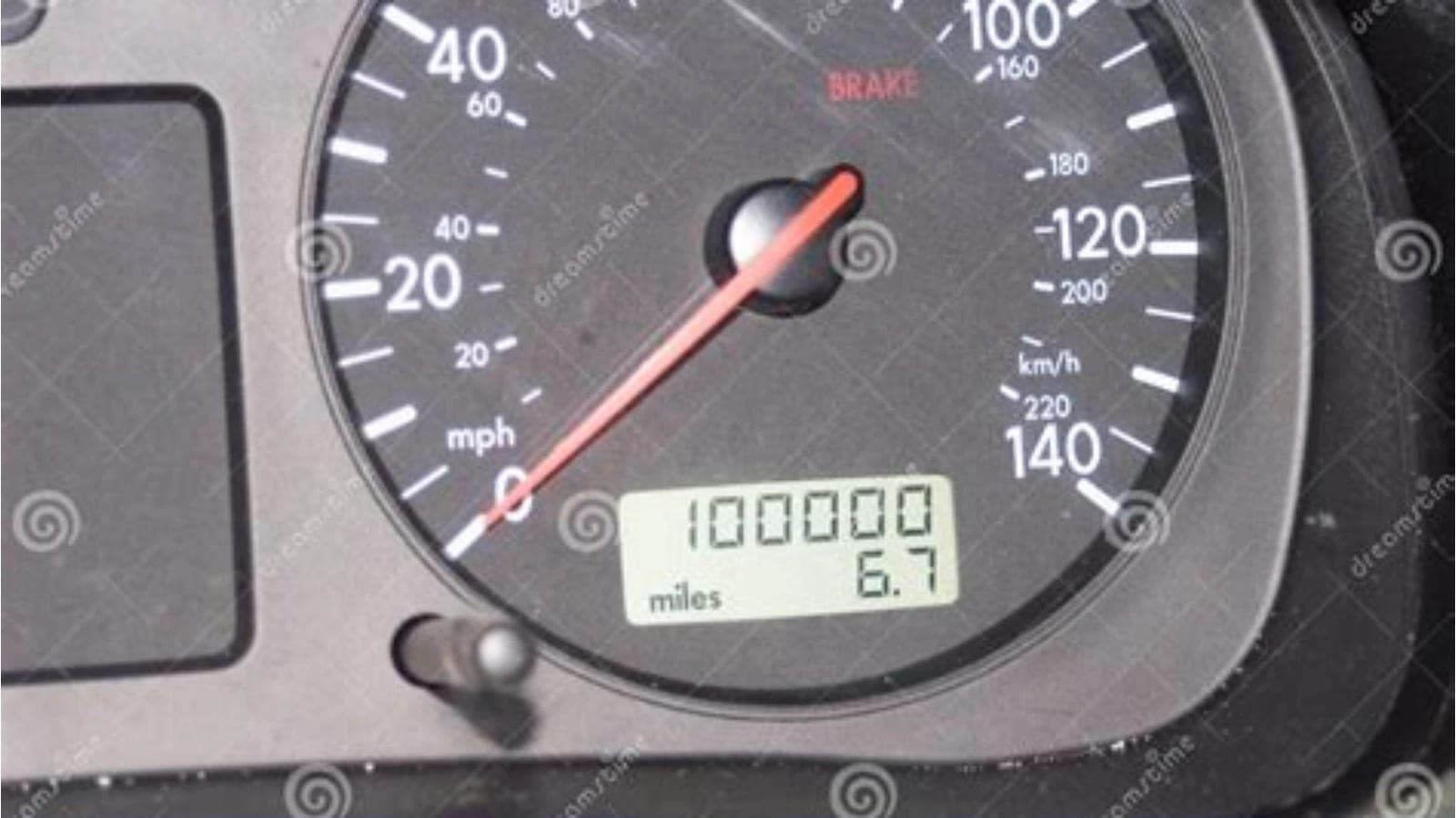 used car odometer mileage check — vehicle photo