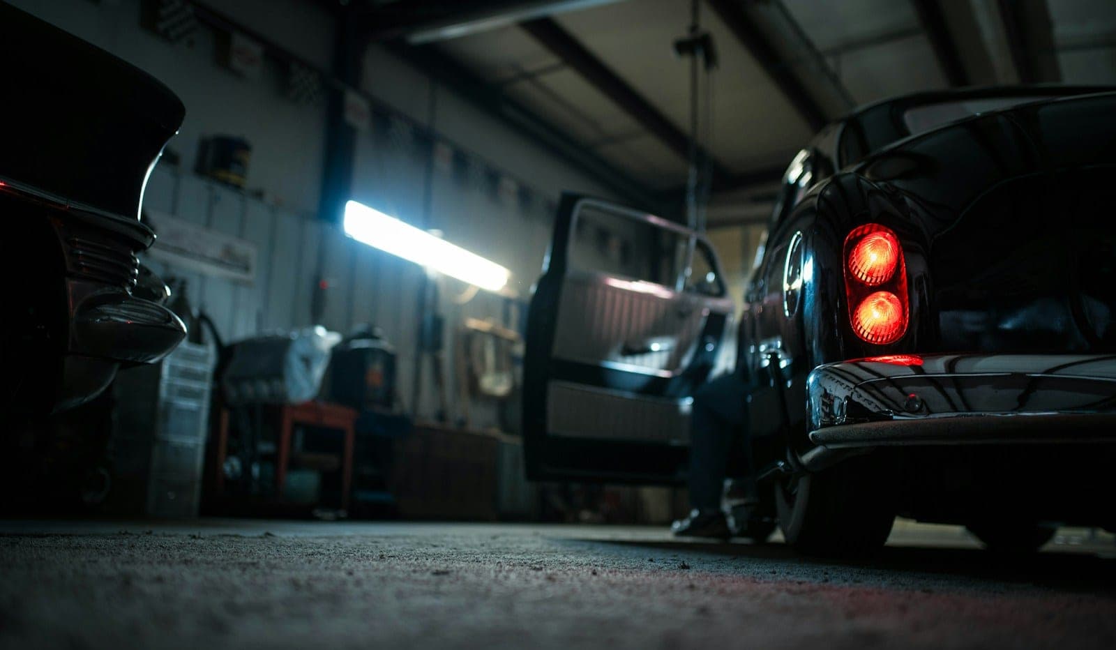 used car inspection garage mechanic — vehicle photo