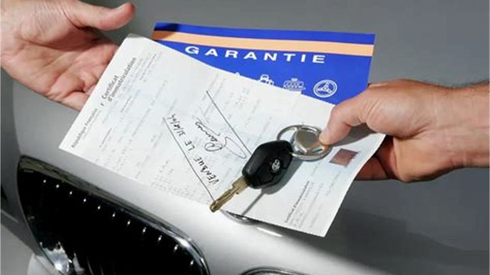 used car dealership contract signing — vehicle photo