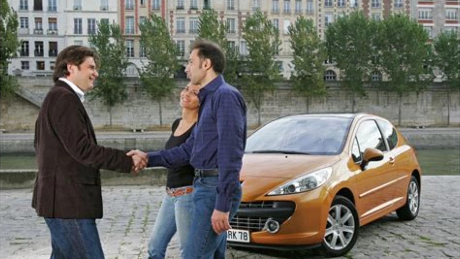 used car private sale handshake — vehicle photo