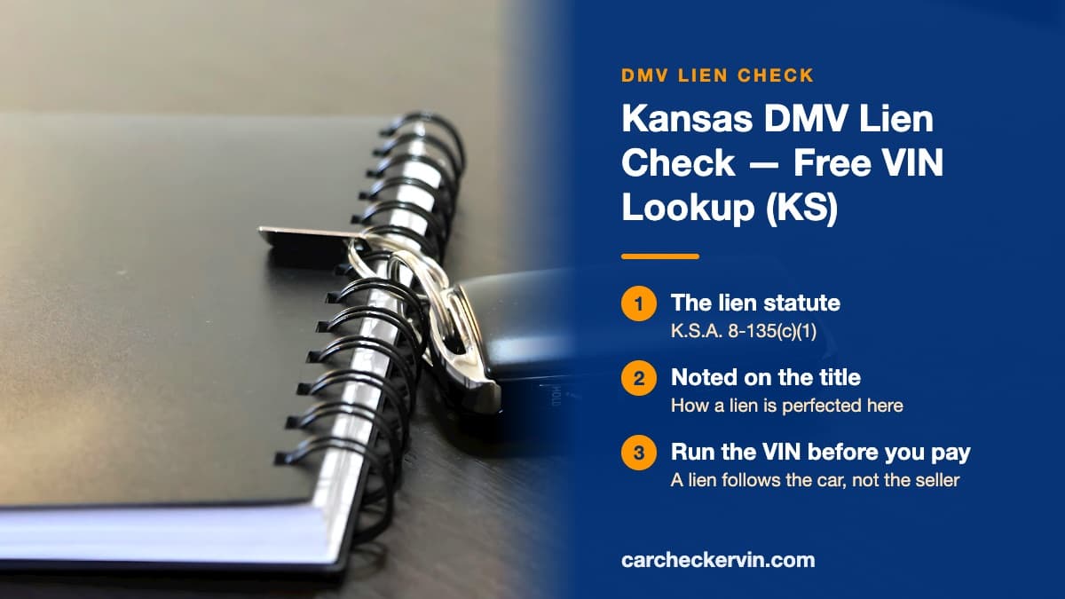 A car key fob resting on a spiral notebook in Kansas