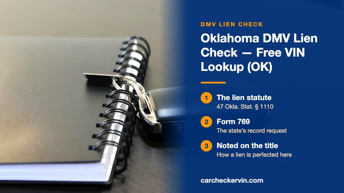 A car key fob resting on a spiral notebook in Oklahoma