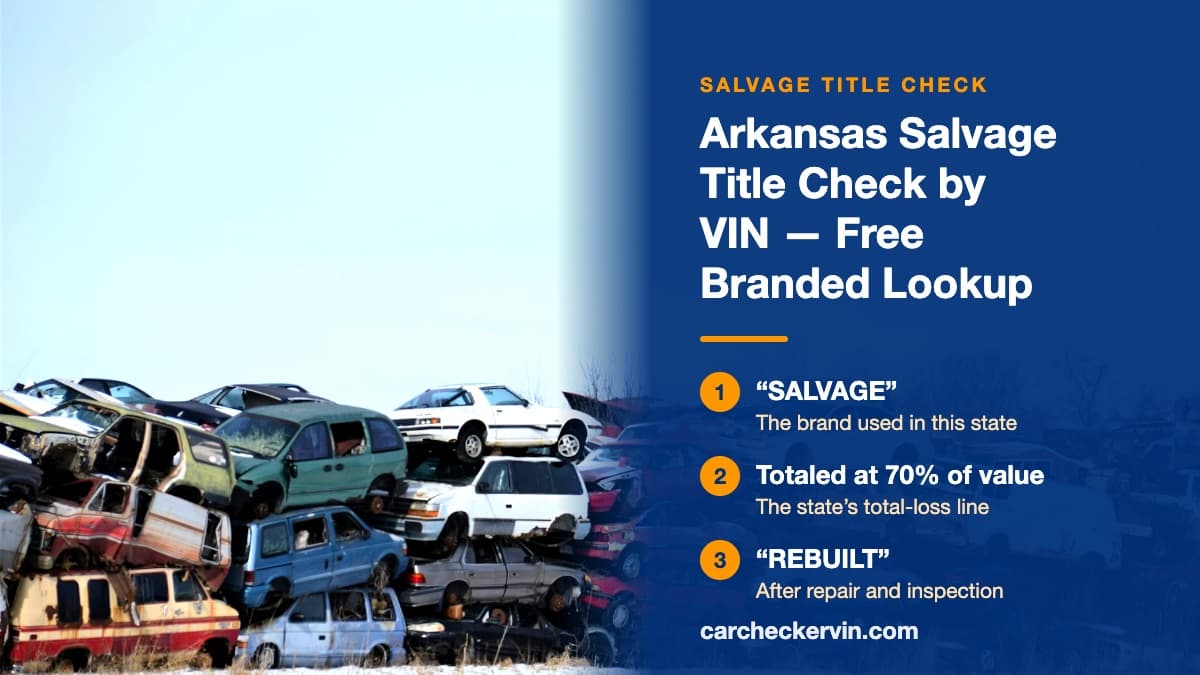 Wrecked cars stacked two and three high at a salvage yard in Arkansas