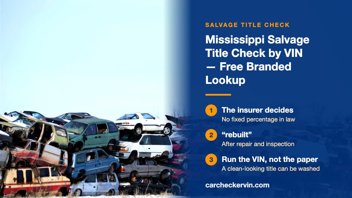 Wrecked cars stacked two and three high at a salvage yard in Mississippi