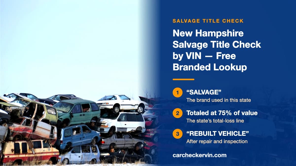 Wrecked cars stacked two and three high at a salvage yard in New Hampshire