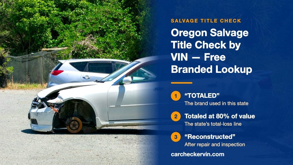 A wrecked sedan in Oregon resting on its hubs with the wheels removed and its front corner torn open