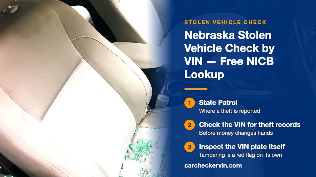 Shattered safety glass scattered across the passenger seat of a car in Nebraska after a break-in