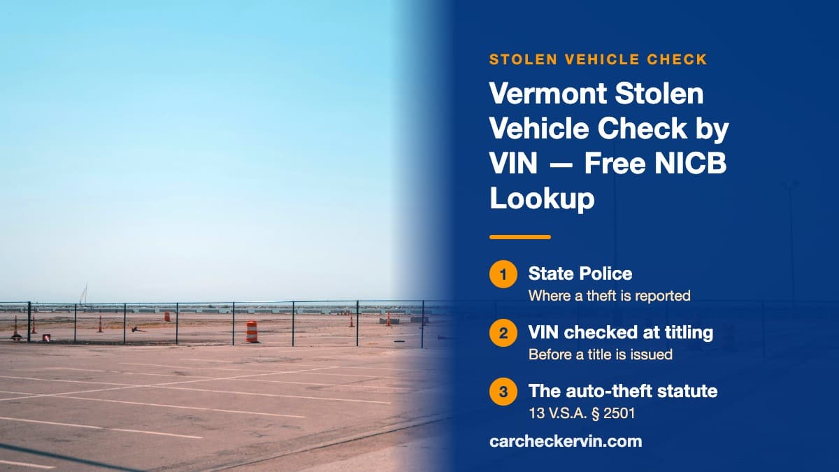 Empty marked parking bays in Vermont behind a chain-link fence, every space unoccupied