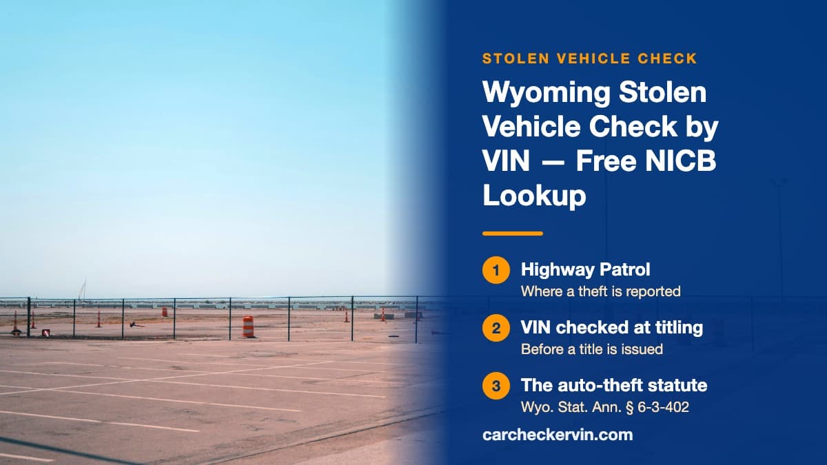 Empty marked parking bays in Wyoming behind a chain-link fence, every space unoccupied